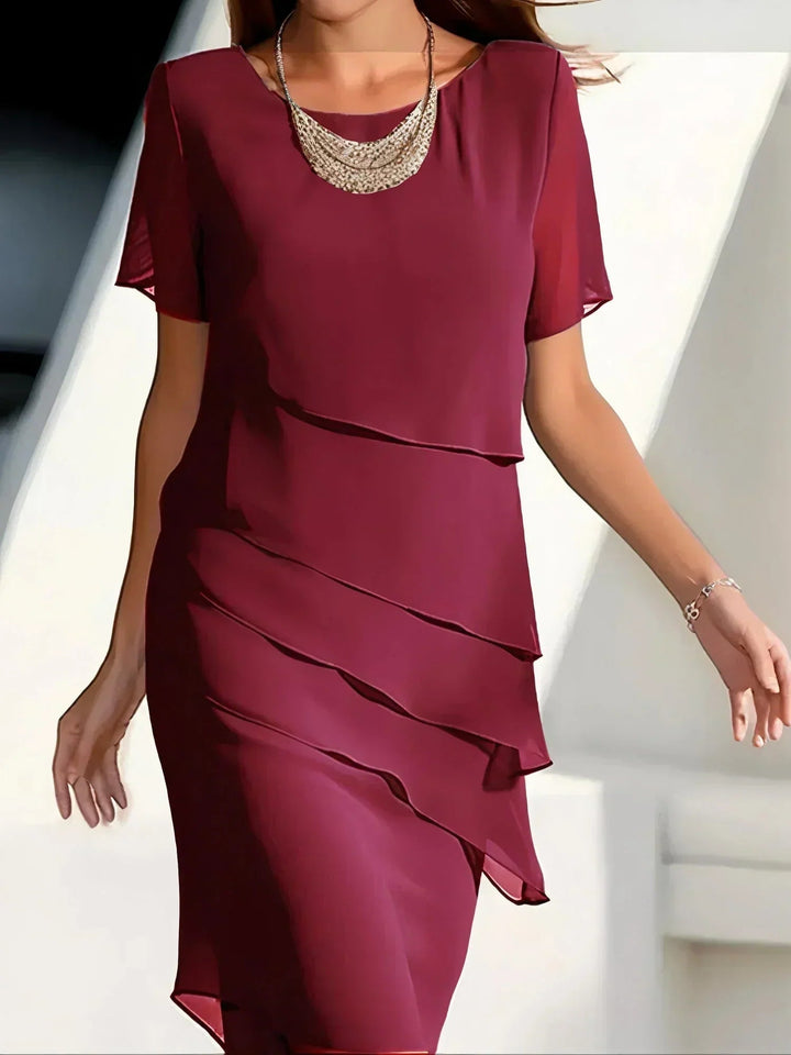 Elegant Women's Dress with Flounced Draping for a Slimming Effect 1