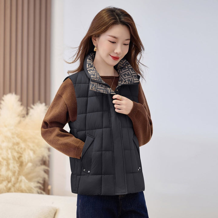 Women's Black Puffer Vest with Stand-Up Collar and Zip for Outdoor Layering 3