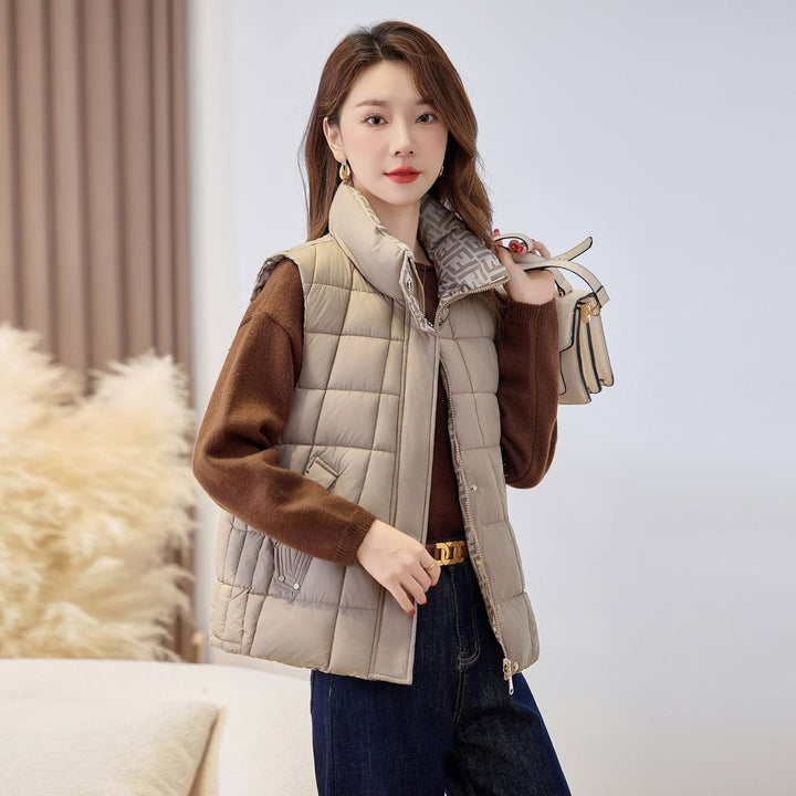 Women's Black Puffer Vest with Stand-Up Collar and Zip for Outdoor Layering 4