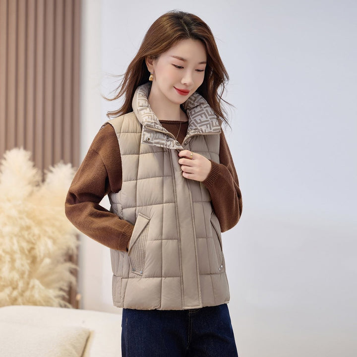 Women's Black Puffer Vest with Stand-Up Collar and Zip for Outdoor Layering 5